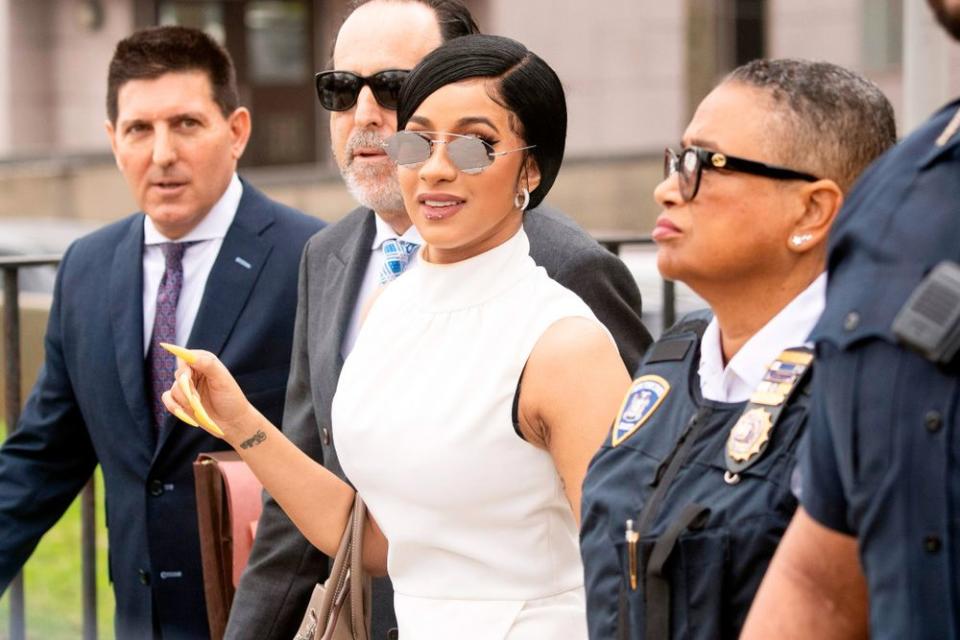 Cardi B leaves court in Queens, New York on April 19 | JOHANNES EISELE/AFP/Getty