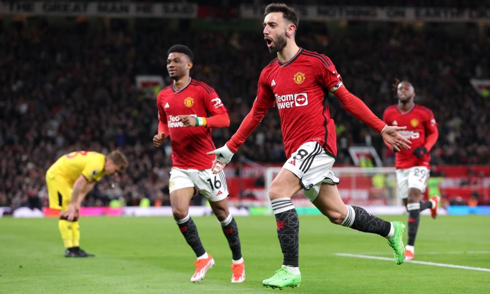 <span>Bruno Fernandes celebrates after scoring his first goal against Sheffield United from the penalty spot.</span><span>Photograph: Alex Livesey/Getty Images</span>