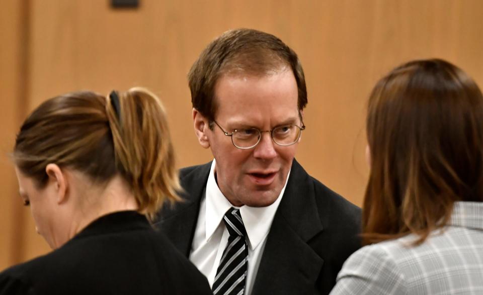 Mark Jensen, center, talks with his attorneys Mackenzie Renner, left, and Bridget Krause during his trial at the Kenosha County Courthouse on Jan. 11, 2023, in Kenosha. The Wisconsin Supreme Court ruled in 2021 that Jensen deserved a new trial in the 1998 death of his wife Julie Jensen.