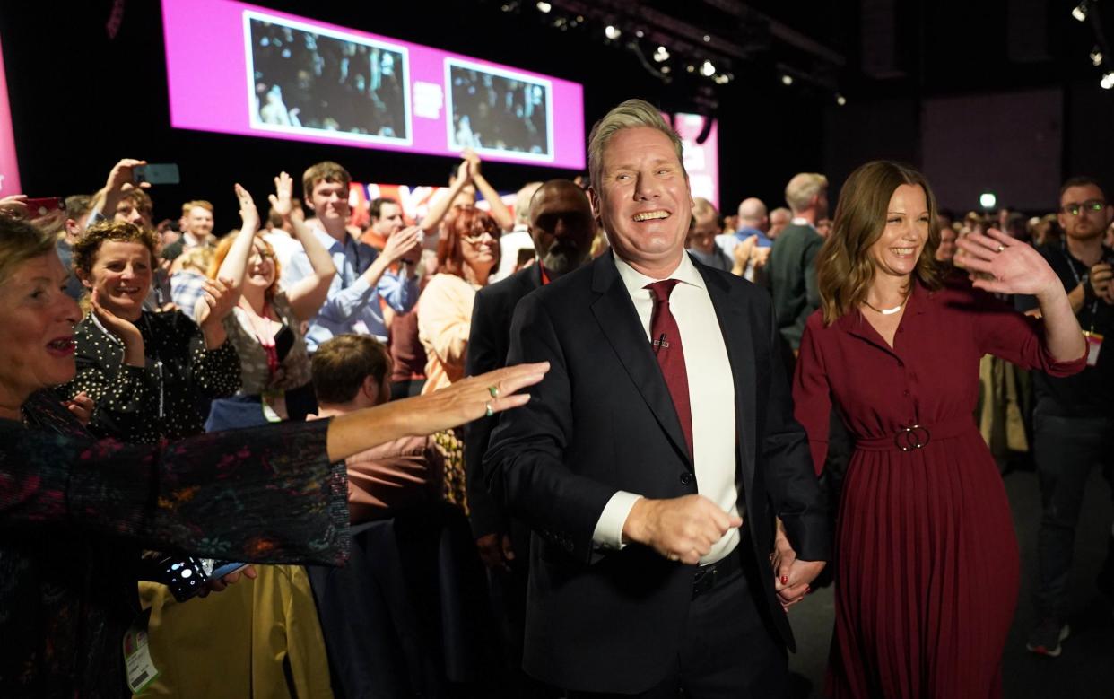 Sir Keir Starmer, with his wife, Victoria, leaves the stage after his speech in Liverpool - Stefan Rousseau/PA