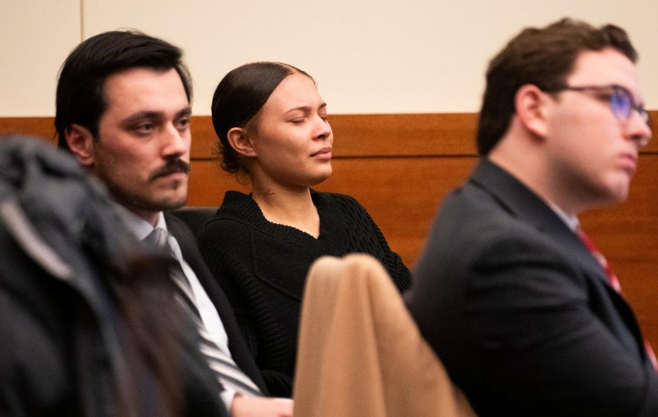 Marizah Thomas,19 closes her eyes Jan. 17, 2024, as she sits with her defense team and listens to opening arguments in her trial on murder charges in on Jan. 17 in Franklin County Court of Common Pleas.