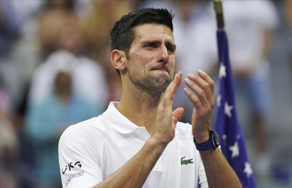 Novak Djokovic, of Serbia, reacts to the crowd after losing to Daniil Medvedev, of Russia, in the men's singles final of the US Open tennis championships, Sunday, Sept. 12, 2021, in New York. (AP Photo/John Minchillo)