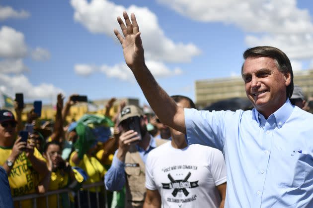 Brazilian President Jair Bolsonaro meets with his supporters during a  demonstration in Brasilia on May 1. (Photo: Photo by Mateus Bonomi/Anadolu Agency via Getty Images)