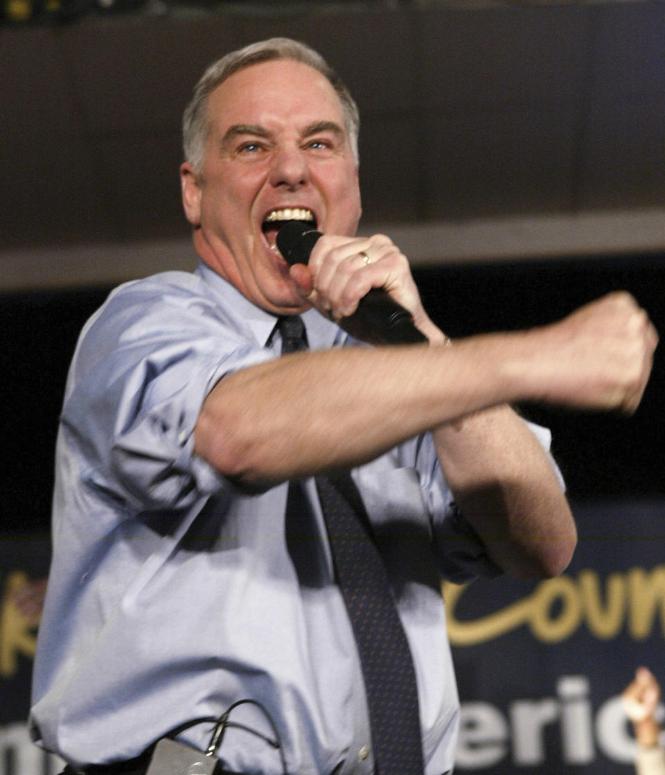 FILE - Democratic presidential hopeful, former Vermont Gov. Howard Dean yells "YEAHHHH!!!" while addressing supporters during his caucus night party in West Des Moines, Iowa, Jan. 19, 2004. (AP Photo/Paul Sancya, File)