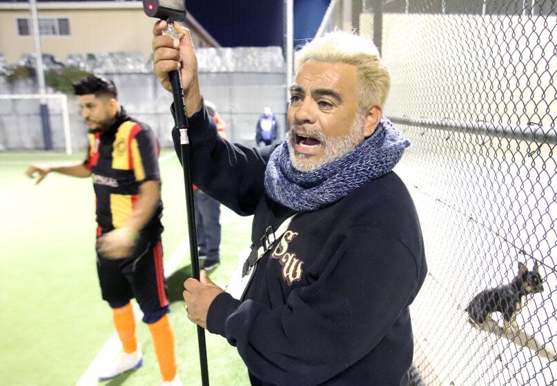 A man watches a soccer game