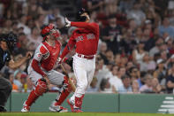 Boston Red Sox's Masataka Yoshida flies out as Cincinnati Reds catcher Curt Casali watches the ball during the sixth inning of a baseball game Thursday, June 1, 2023, in Boston. (AP Photo/Steven Senne)