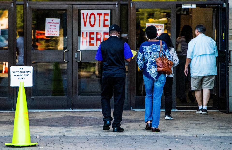 Voters arrive to vote at the Frazer Church voting precinct as municipal election day begins in Montgomery, Ala., on Tuesday August 22, 2023.