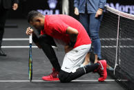 Nick Kyrgios of Team World joined NFL stars from Wembley by dropping his knee before his Laver Cup match with Roger Federer today during his mens singles match against Roger Federer of Team Europe on the final day of the Laver cup on September 24, 2017 in Prague, Czech Republic. (Photo by Julian Finney/Getty Images for Laver Cup)