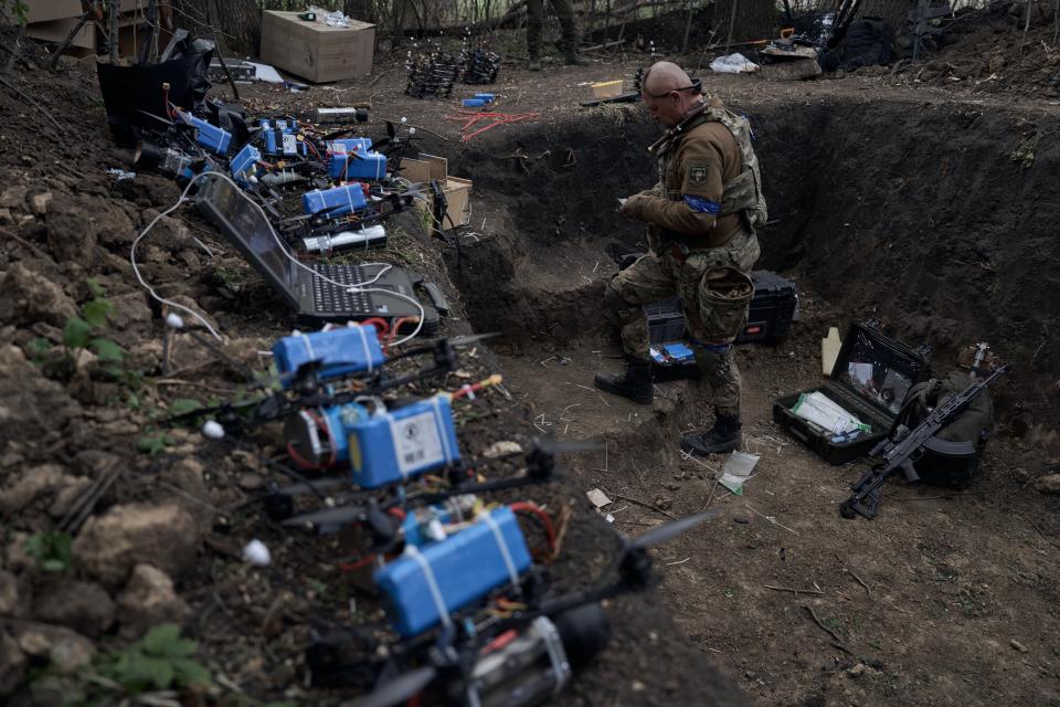 A pilot of the ‘Sharp Kartuza’ division of FPV kamikaze drones mans a dugout filled with explosives near the Russian border (Getty Images)