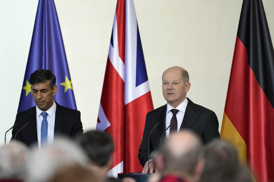 Britain's Prime Minister Rishi Sunak, left, and German Chancellor Olaf Scholz address the media during a press conference in Berlin, Germany, Wednesday, April 24, 2024.(AP Photo/Alastair Grant, Pool)