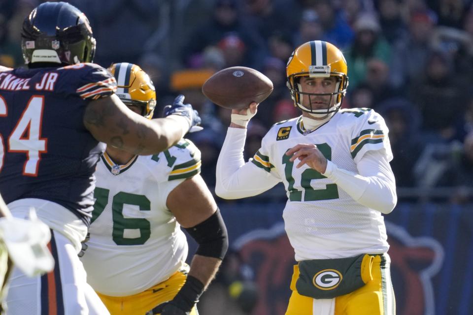 Green Bay Packers' Aaron Rodgers throws during the first half of an NFL football game against the Chicago Bears Sunday, Dec. 4, 2022, in Chicago. (AP Photo/Nam Y. Huh)