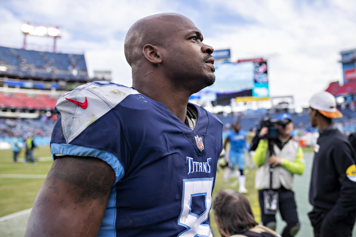 NASHVILLE, TENNESSEE - NOVEMBER 14:  Adrian Peterson #8 of the Tennessee Titans looks for someone in the stands after a game against the New Orleans Saints at Nissan Stadium on November 14, 2021 in Nashville, Tennessee.  The Titans defeated the Saints 23-21.  (Photo by Wesley Hitt/Getty Images)