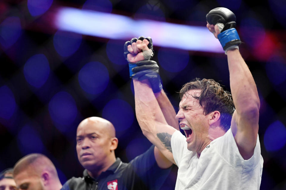 Jul 6, 2019; Las Vegas, NV, USA; Chance Rencountre (blue gloves) reacts after his win over Ismail Naurdiev (red gloves) at T-Mobile Arena. Mandatory Credit: Stephen R. Sylvanie-USA TODAY Sports