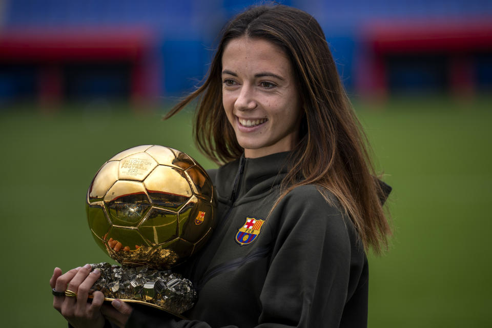 FC Barcelona and Spain's national team midfielder Aitana Bonmati holds the 2023 Women's Ballon d'Or trophy, during a press conference in Barcelona, Spain, Thursday, Nov. 2, 2023. (AP Photo/Emilio Morenatti)