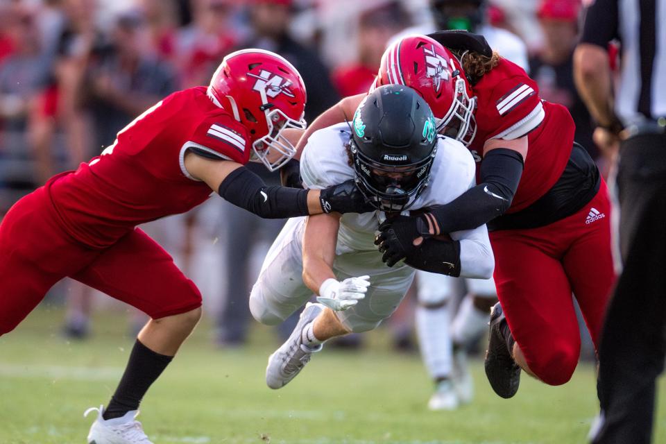 Jones’ Mason Weiher (1) receives and runs the ball during a high school football game between Washington High School and Jones High School in Washington, Okla., on Friday, Sept. 8, 2023.