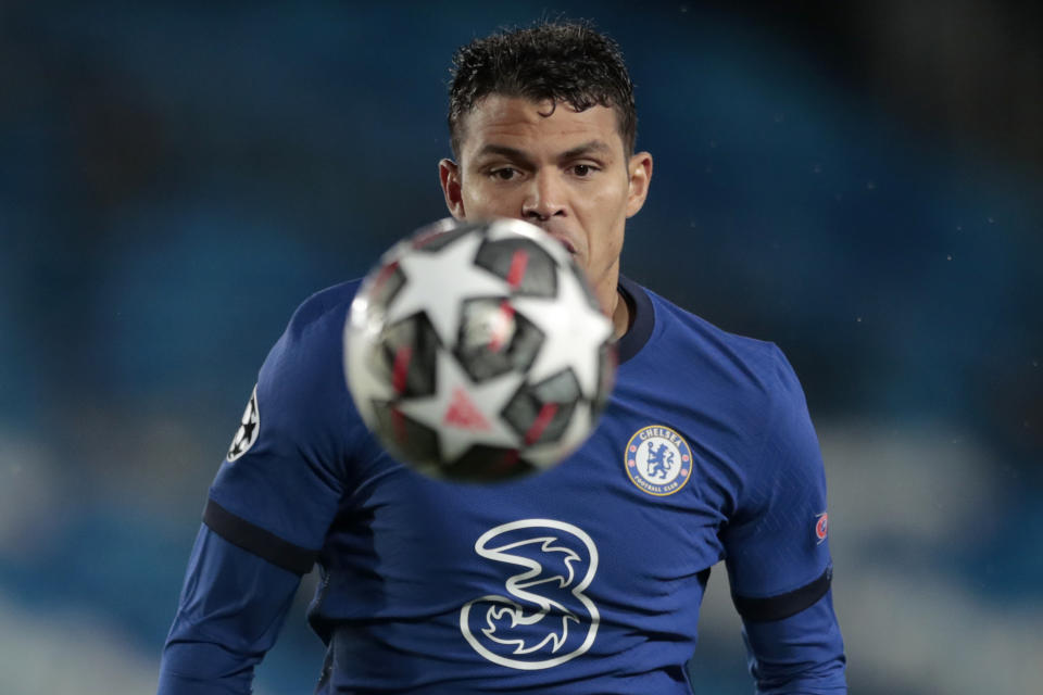Chelsea's Thiago Silva eyes the ball during the Champions League semifinal first leg soccer match between Real Madrid and Chelsea at the Alfredo di Stefano stadium in Madrid, Spain, Tuesday, April 27, 2021. (AP Photo/Bernat Armangue)