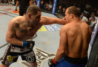 Cain Velasquez versus Junior dos Santos during their heavyweight championship fight at UFC 155 on December 29, 2012 at MGM Grand Garden Arena in Las Vegas, Nevada. (Photo by Donald Miralle/Zuffa LLC/Zuffa LLC via Getty Images)