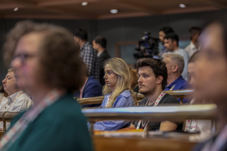 Delegates from the Group of 20 nations attend a tourism meeting in Srinagar, Indian controlled Kashmir, Monday, May 22, 2023. The meeting condemned by China and Pakistan is the first significant international event in Kashmir since New Delhi stripped the Muslim-majority region of semi-autonomy in 2019. (AP Photo/Mukhtar Khan)