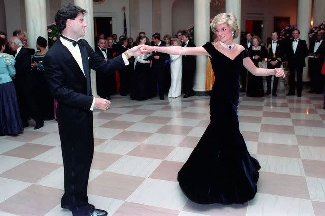 <p>White House Photo / Alamy Stock Photo</p> John Travolta dances with Princess Diana.