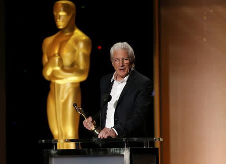 Actor Richard Gere speaks on stage before presenting an award at the 8th Annual Governors Awards in Los Angeles, California, U.S., November 12, 2016. REUTERS/Mario Anzuoni