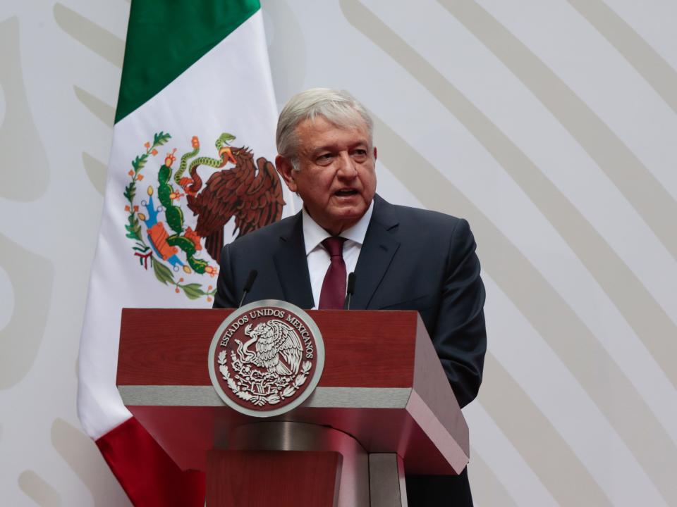 FILE - In this April 5, 2020 file photo, Mexican President Andres Manuel Lopez Obrador speaks at the National Palace in Mexico City. Over the May 17, 2020 weekend, the administration of President Lopez Obrador has cited the coronavirus pandemic as a justification for new rules that will reduce the role of renewable energies like solar and wind power, granting a reprieve to the government’s own ageing, fossil-fuel power plants.  (AP Photo/Eduardo Verdugo, File)