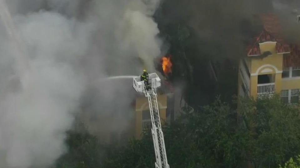 More than 30 fire crews were called in to battle the massive apartment fire.  / Credit: CBS News Miami