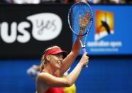 Maria Sharapova of Russia celebrates after defeating Eugenie Bouchard of Canada in their women's singles quarter-final match at the Australian Open 2015 tennis tournament in Melbourne January 27, 2015. REUTERS/Issei Kato