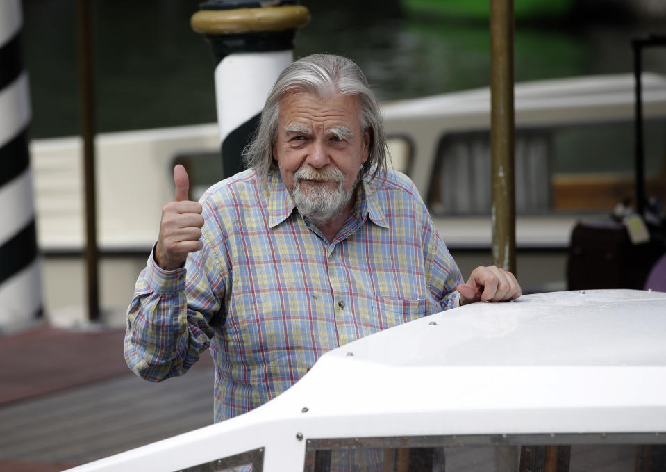 FILE - In n this Sept.4, 2012 file photo, actor Michael Lonsdale arrives at the 69th edition of the Venice Film Festival in Venice, Italy. Michael Lonsdale, a French-British actor and giant of the silver screen and theatre in France, died on Monday, his agent said. From his role as villain in the 1979 James Bond film "Moonraker" to that of a monk in Algeria in "Of Gods and Men," Lonsdale worked, often in second roles, with top directors from Orson Wells to Spielberg.(AP Photo/Andrew Medichini, File)