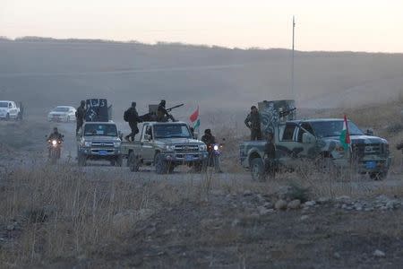 Peshmerga forces advance in the east of Mosul to attack Islamic State militants in Mosul, Iraq, October 17, 2016. REUTERS/Azad Lashkari