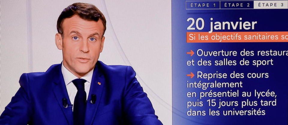 This screen grab made on November 24, 2020 shows French President Emmanuel Macron speaking during a televised address to the Nation on the Covid-19 pandemic and lockdown measures in France as the second virus wave reached its peak last week, French health authorities said, with numbers of new infections, new hospital admissions and new intensive care patients all declining, while death figures have stabilised. (Photo by THOMAS COEX / AFP)