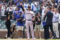 San Francisco Giants' Kris Bryant greets Chicago Cubs fans before a baseball game starts in Chicago, Friday, Sept. 10, 2021. (AP Photo/Nam Y. Huh)