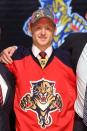 PITTSBURGH, PA - JUNE 22: Michael Matheson, 23rd overall pick by the Florida Panthers, poses on stage during Round One of the 2012 NHL Entry Draft at Consol Energy Center on June 22, 2012 in Pittsburgh, Pennsylvania. (Photo by Bruce Bennett/Getty Images)