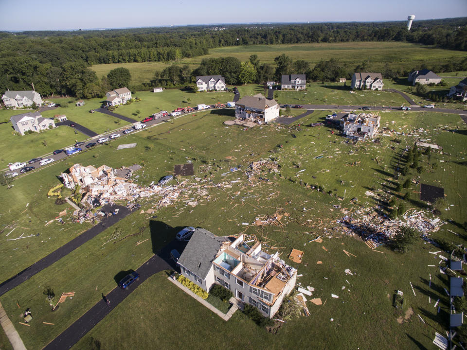 Homes damaged from the remnants of Hurricane Ida on Josephine Lane in Mullica Hill, N.J. on Thursday, Sept. 2, 2021. (Monica Herndon/The Philadelphia Inquirer via AP)