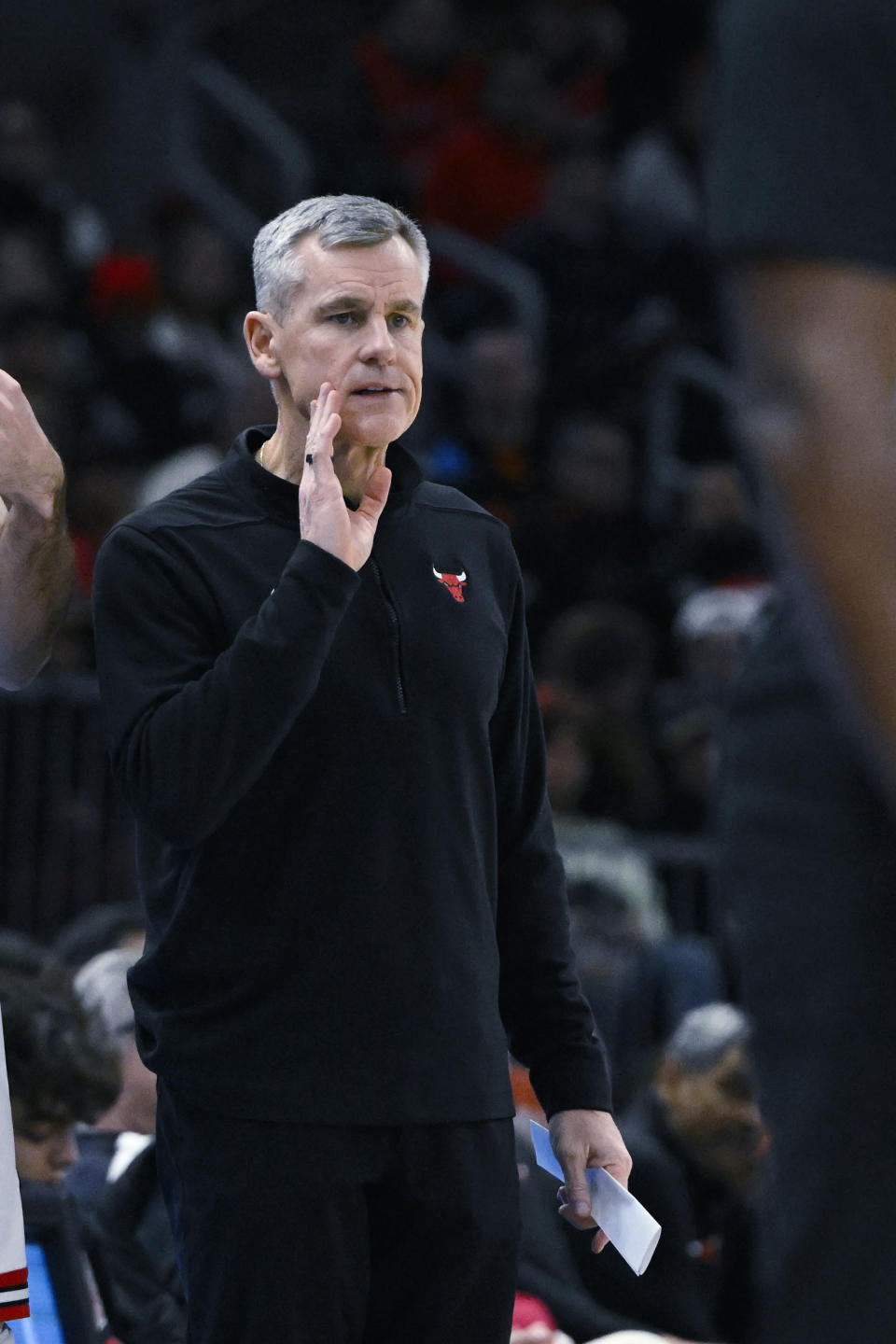 Chicago Bulls coach Billy Donovan talks to players during the first half of the team's NBA basketball game against the Cleveland Cavaliers, Saturday, Dec. 23, 2023, in Chicago. (AP Photo/Matt Marton)