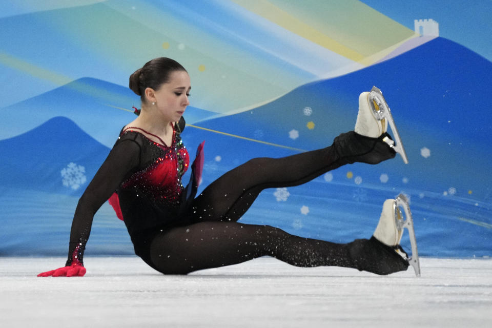 Kamila Valieva, of the Russian Olympic Committee, falls in the women's free skate program during the figure skating competition at the 2022 Winter Olympics, Thursday, Feb. 17, 2022, in Beijing. (AP Photo/Bernat Armangue)