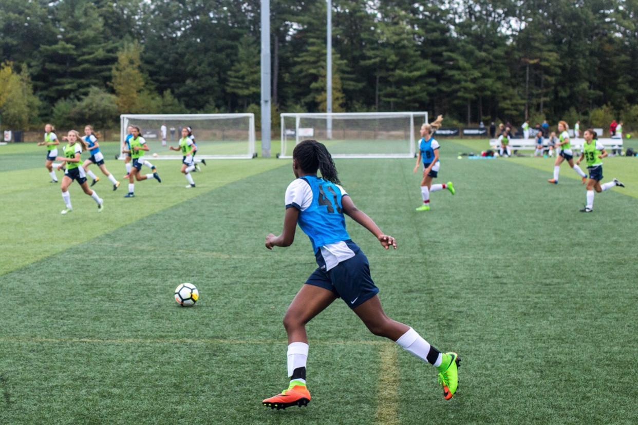 High school senior Precious Ogu plays soccer.