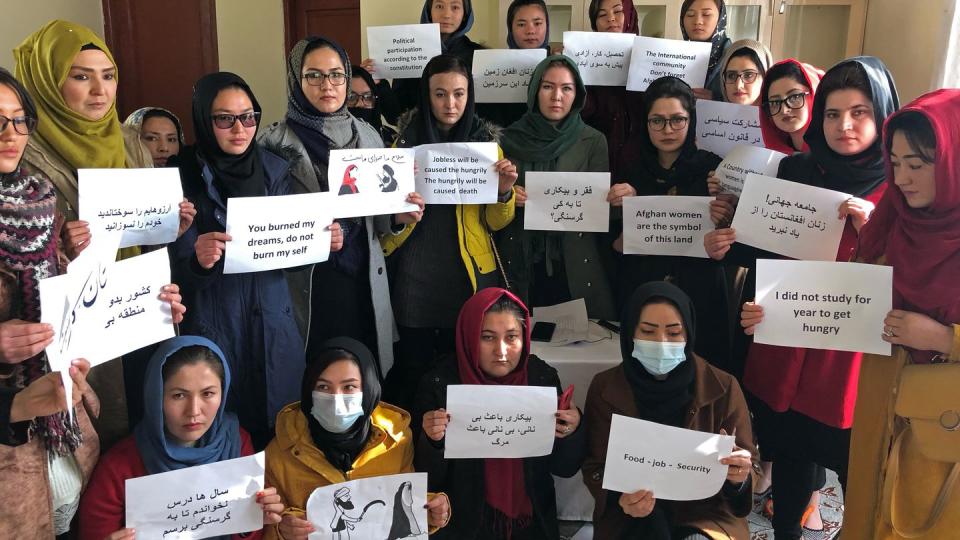 Afghan women chant and hold signs of protest, in Kabul, Afghanistan, Monday, Dec. 27, 2021. (Mohammed Shoaib Amin/AP, File)