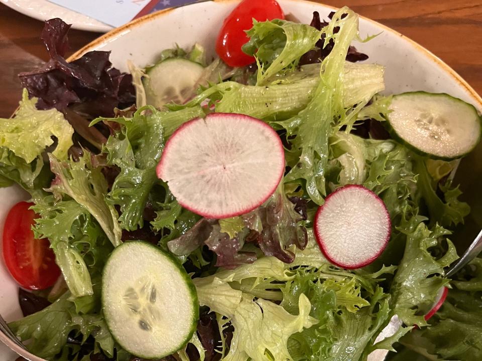 mixed-green salad at diamond horseshoe restaurant in disney world