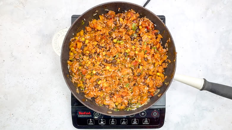 rice, bean, and corn mixture in pan