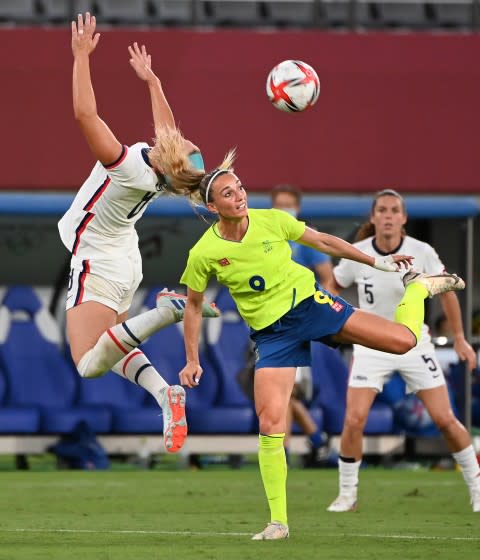 -SP- July 21, 2021: USA's Julie Ertz battles for the ball wit Sweden's Kosovare.