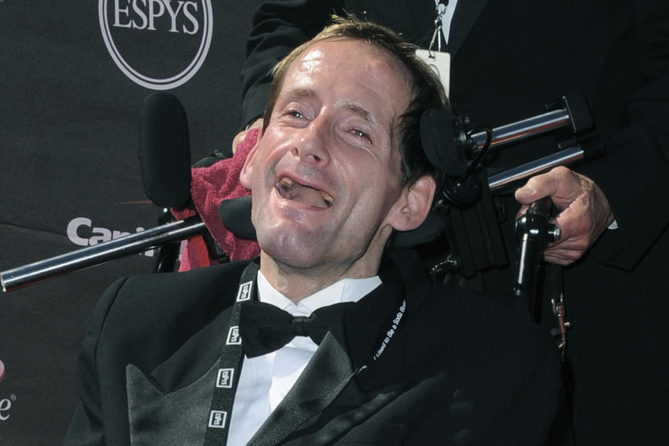 Rick Hoyt arrive at the ESPY Awards on Wednesday, July 17, 2013, at Nokia Theater in Los Angeles. Hoyt, who with his father pushing his wheelchair became a fixture at the Boston Marathon and other races for decades, has died. He was 61. Hoyt died of complications with his respiratory system, his family announced on Monday, May 22, 2023. (Photo by Jordan Strauss/Invision/AP, File)