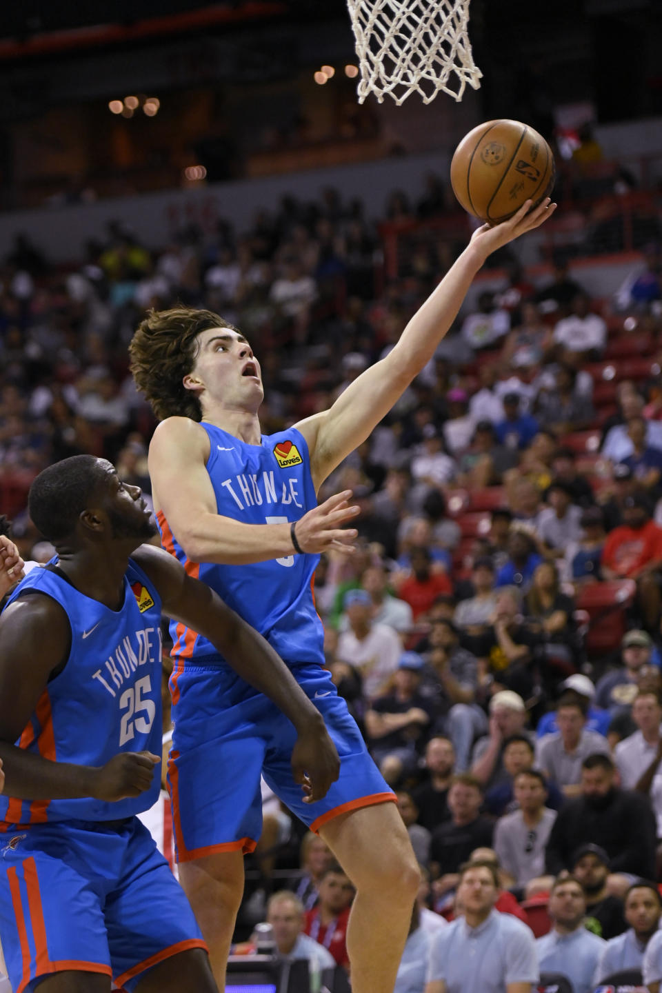 Oklahoma City Thunder's Josh Giddey (3) shoots during the second half of the team's NBA summer league basketball game against the Houston Rockets on Saturday, July 9, 2022, in Las Vegas. (AP Photo/David Becker)