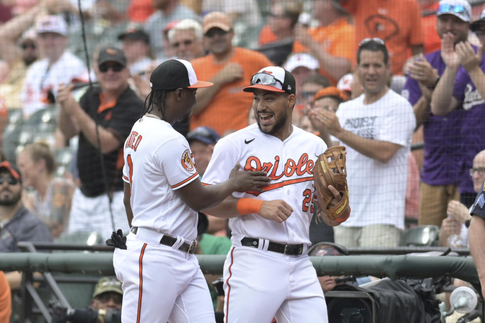 Baltimore Orioles' Jorge Mateo (3) and teammate Anthony Santander (25) have been part of the O's hot streak. (AP Photo/Tommy Gilligan)