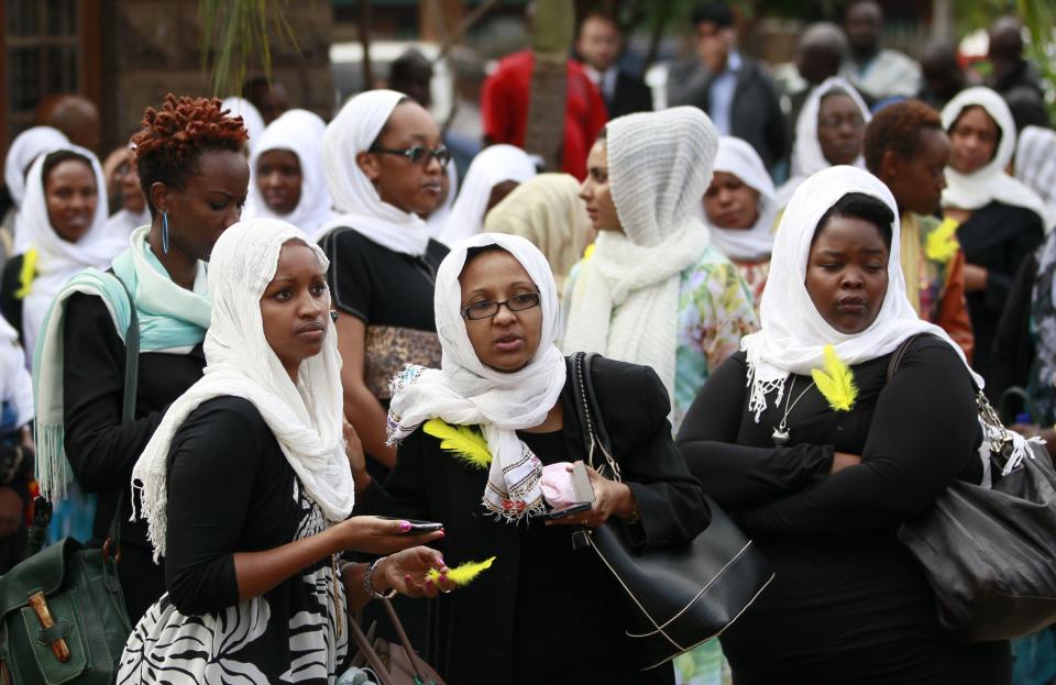 Kenyan journalists gather for the funeral prayers of their colleague Sood, who was killed in the Westgate shopping mall attack, in Nairobi