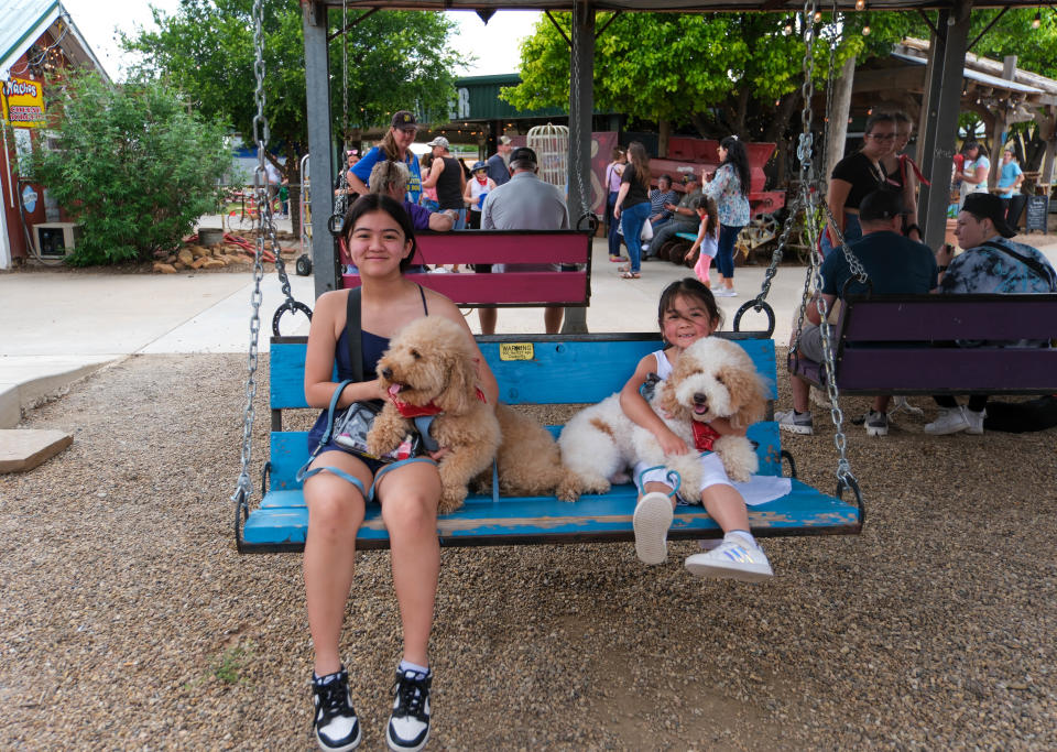 Ayla with her dog Drake win the contest for best pet lookalike Sunday at the 30th annual Muttfest at the Starlight Ranch Event Center in Amarillo.