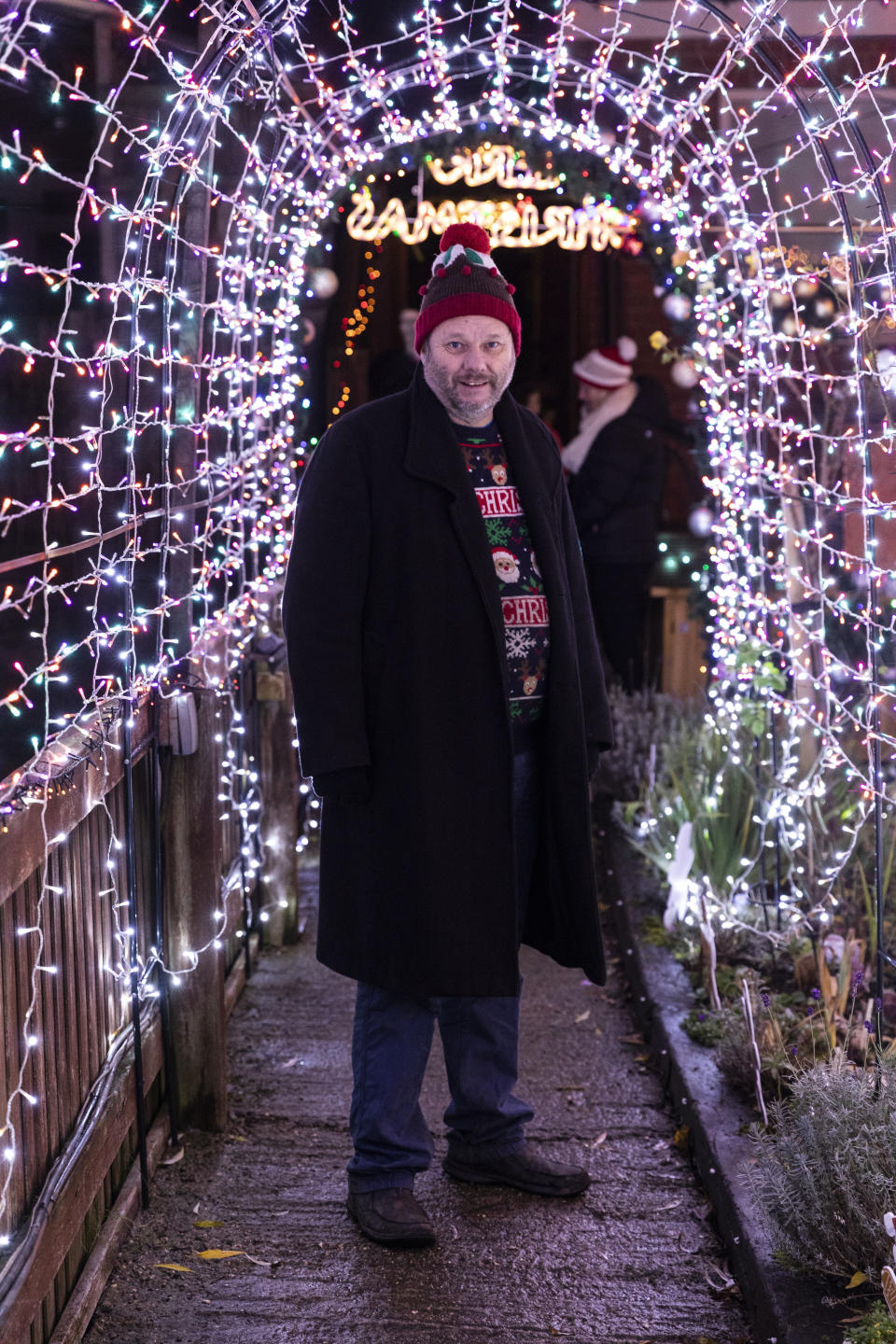 Nigel Watkinson in his garden in Scarborough, North Yorkshire