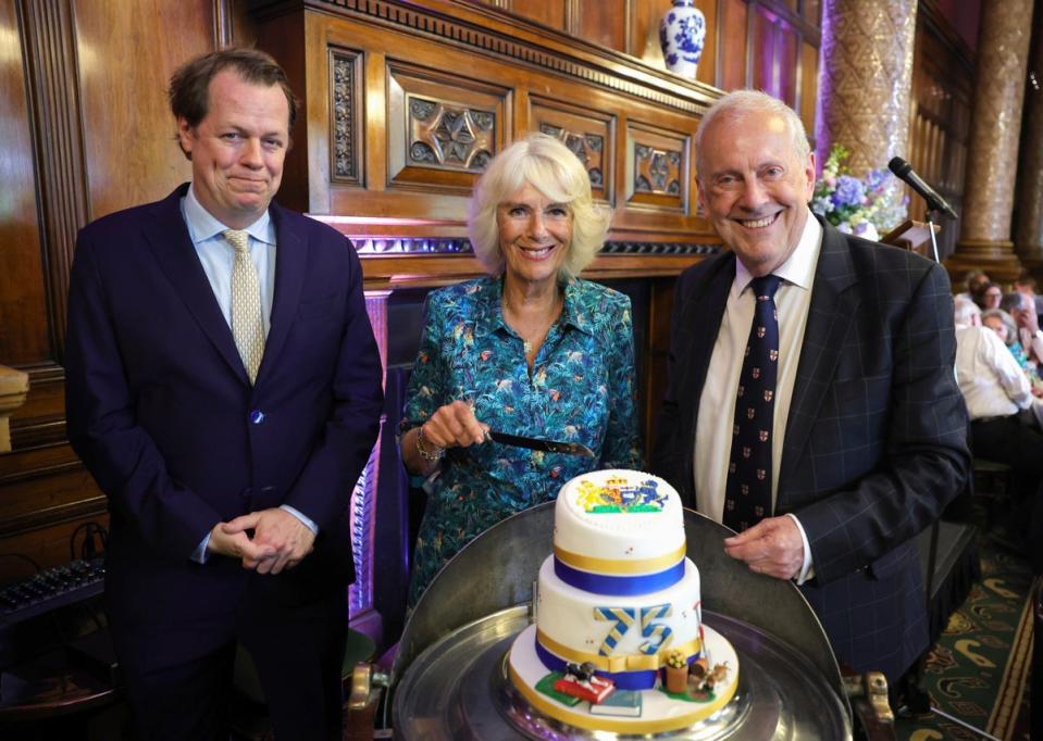 Tom Parker Bowles, left, Camilla, Duchess of Cornwall, and Gyles Brandreth, founder of Poetry Together, right, in 2022 (2022 Getty Images)