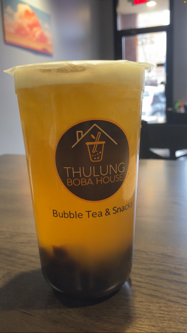 A large peach tea with tapioca pearls made by Thulung Boba House in downtown Cuyahoga Falls.