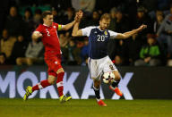 Britain Football Soccer - Scotland v Canada - International Friendly - Easter Road, Edinburgh, Scotland - 22/3/17 Canada’s Nikolas Ledgerwood in action with Scotland’s Jordan Rhodes Action Images via Reuters / Jason CairnduffLivepic