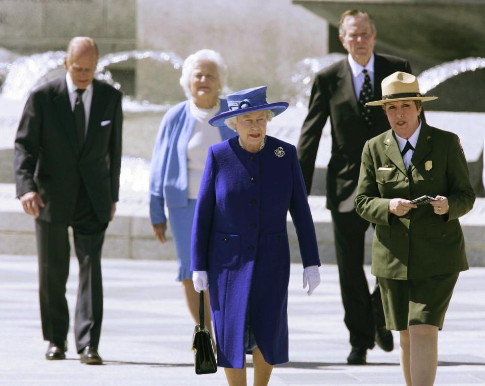 The Queen and Prince Philip with former president George HW Bush, former first lady Barbara, and United States Park Service director Mary Bomaras, during a visit to the World War II Memorial in Washington DC, in May 2007 (AFP/Getty)